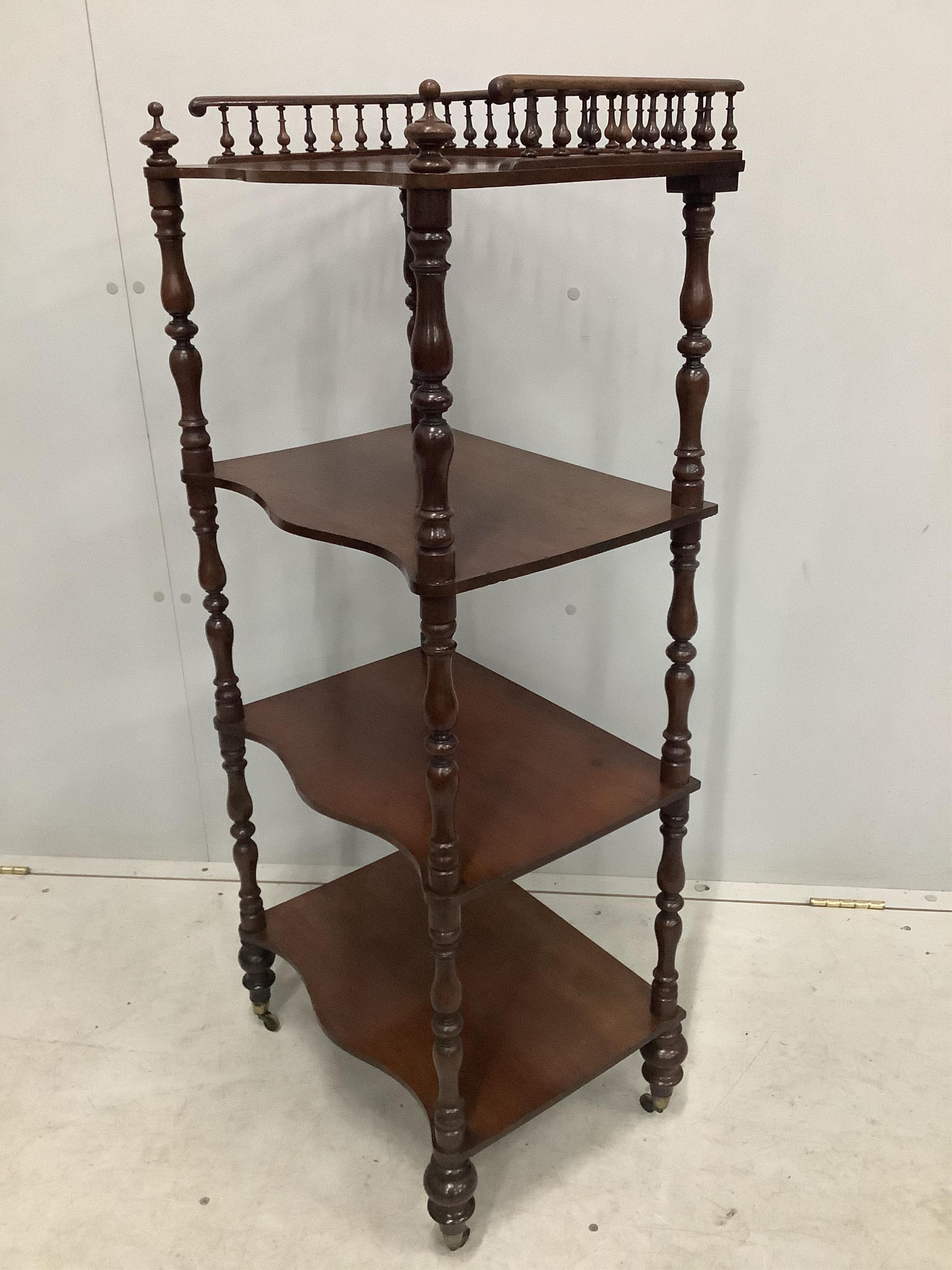 A Victorian four tier mahogany whatnot with a galleried top, width 47cm, depth 33cm, height 113cm. Condition - fair